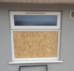 Boarded up window in Harden